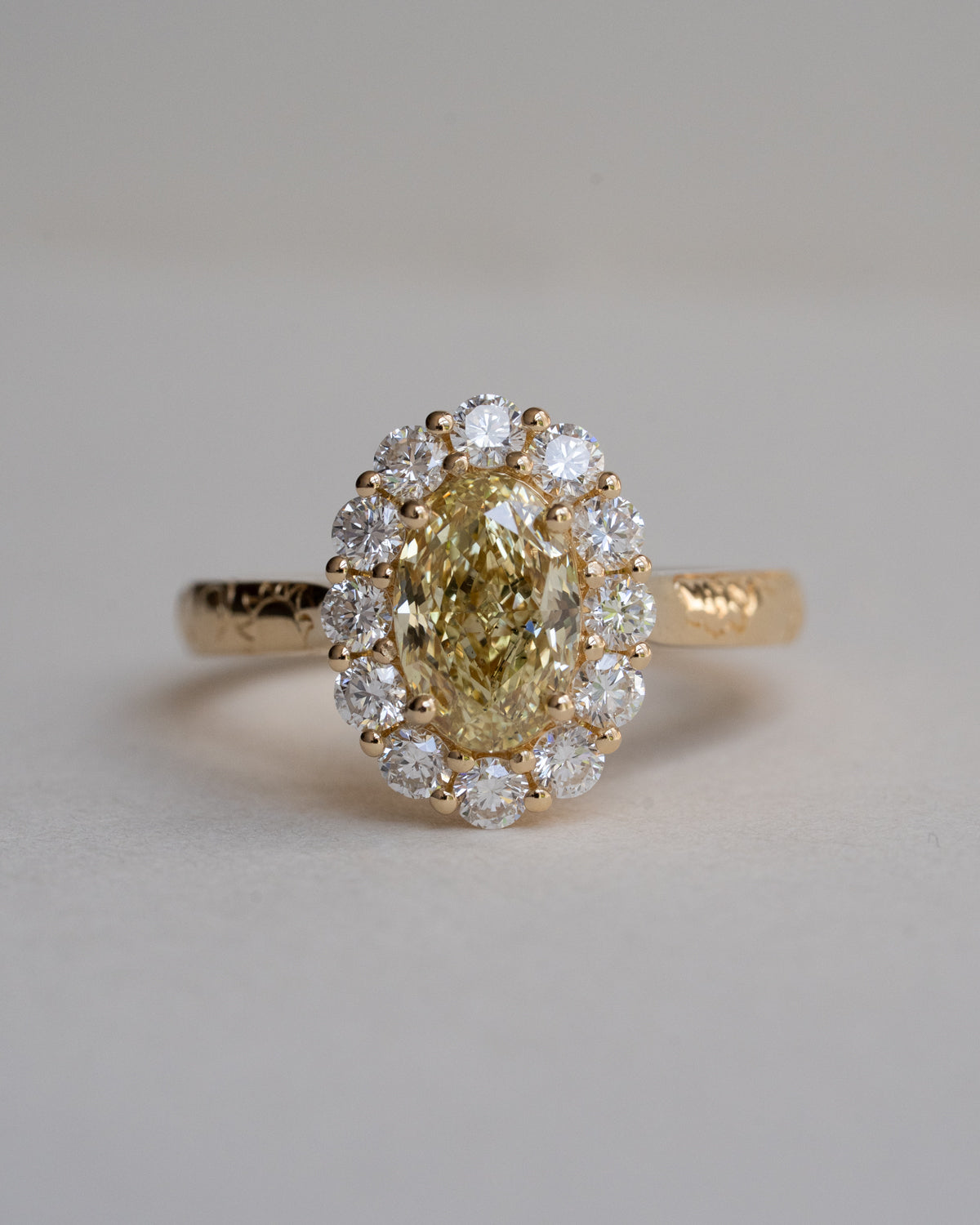 Light Yellow Oval with White Diamond Halo