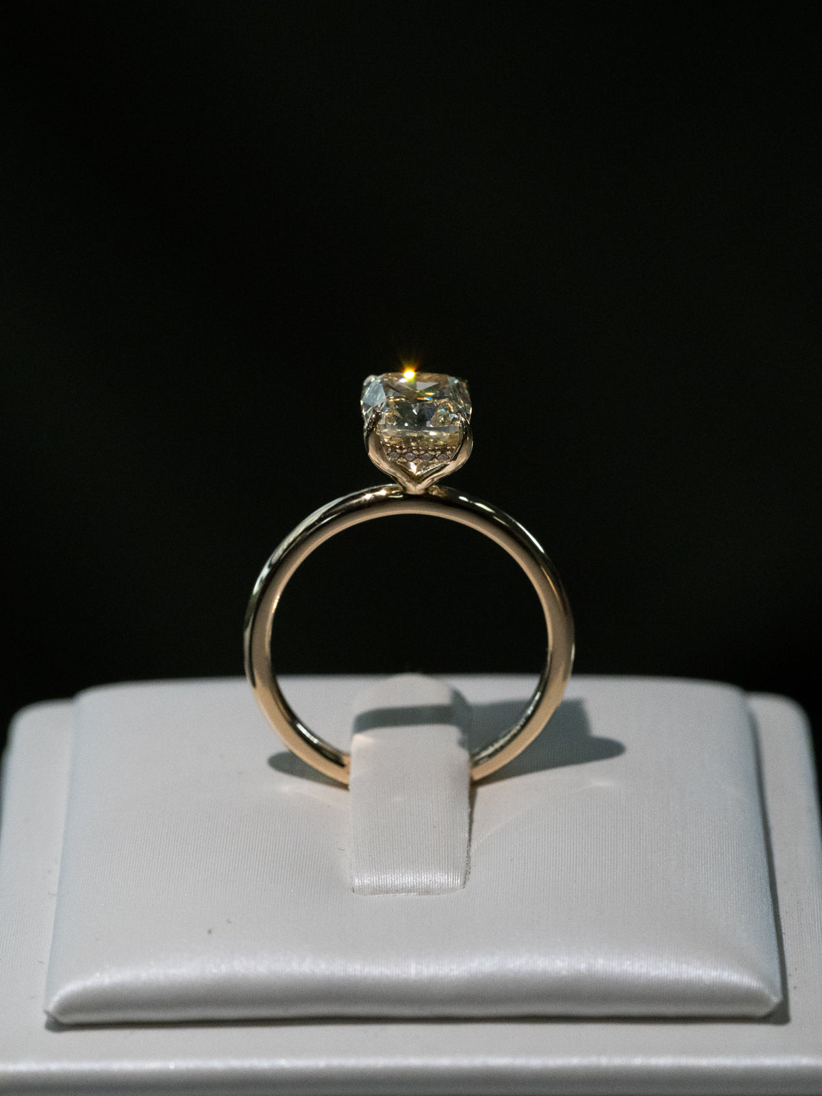 Fancy yellow elongated cushion cut diamond solitaire engagement ring with hidden halo in 18ct yellow gold - custom engagement ring front view
