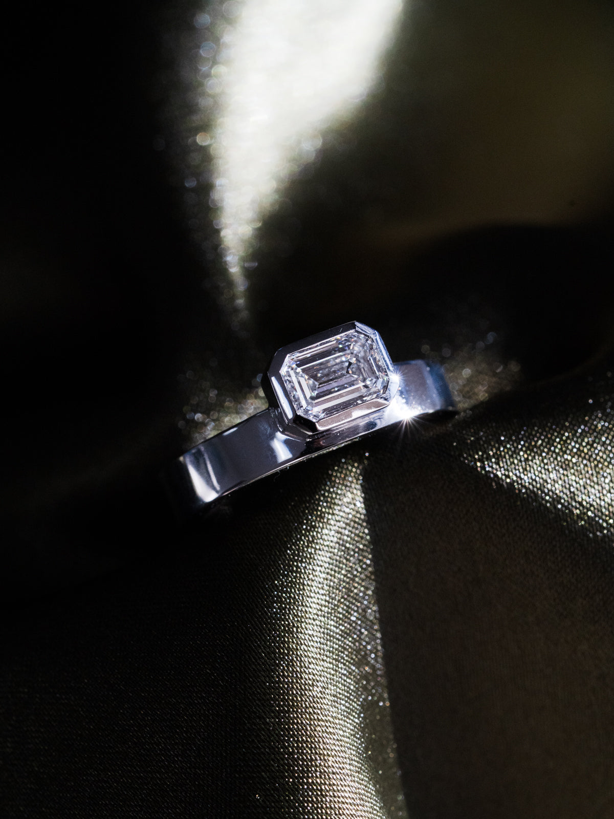 Emerald Cut Bezel Set in Platinum