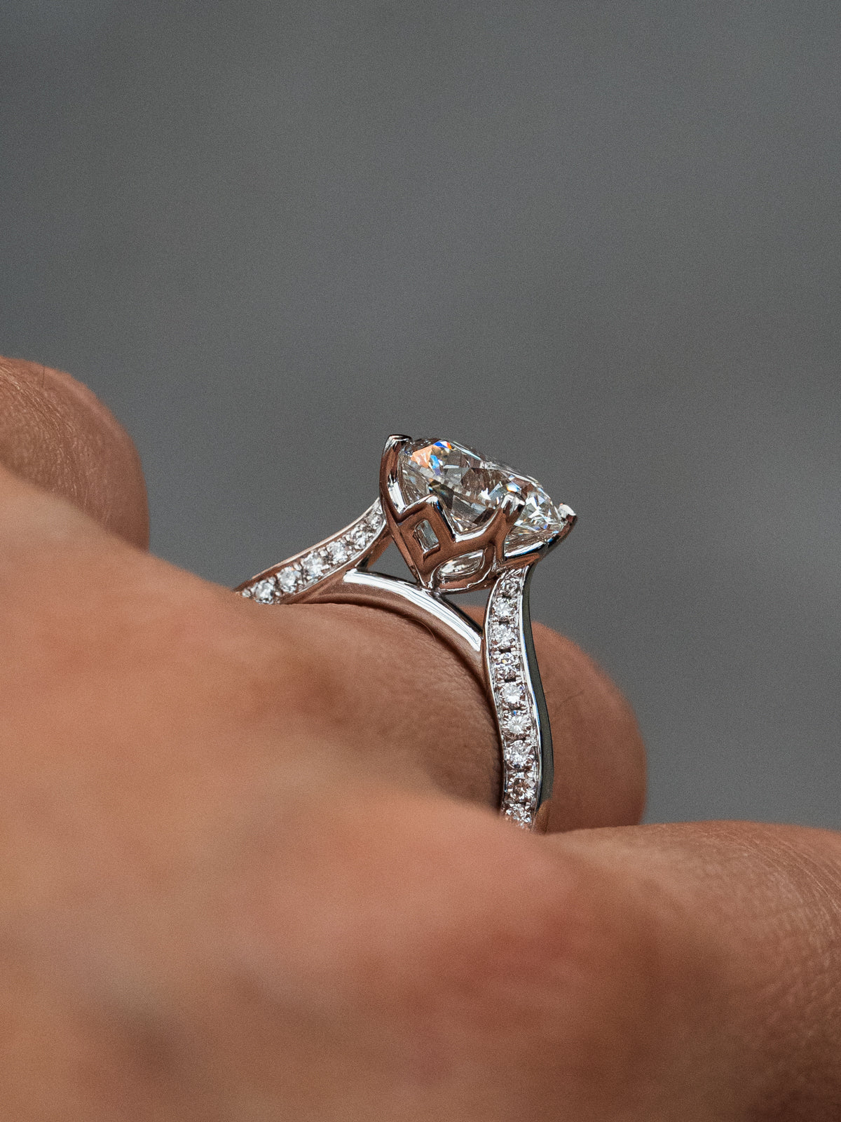 Round Diamond with Hidden Diamonds and Heart Prong Detailing