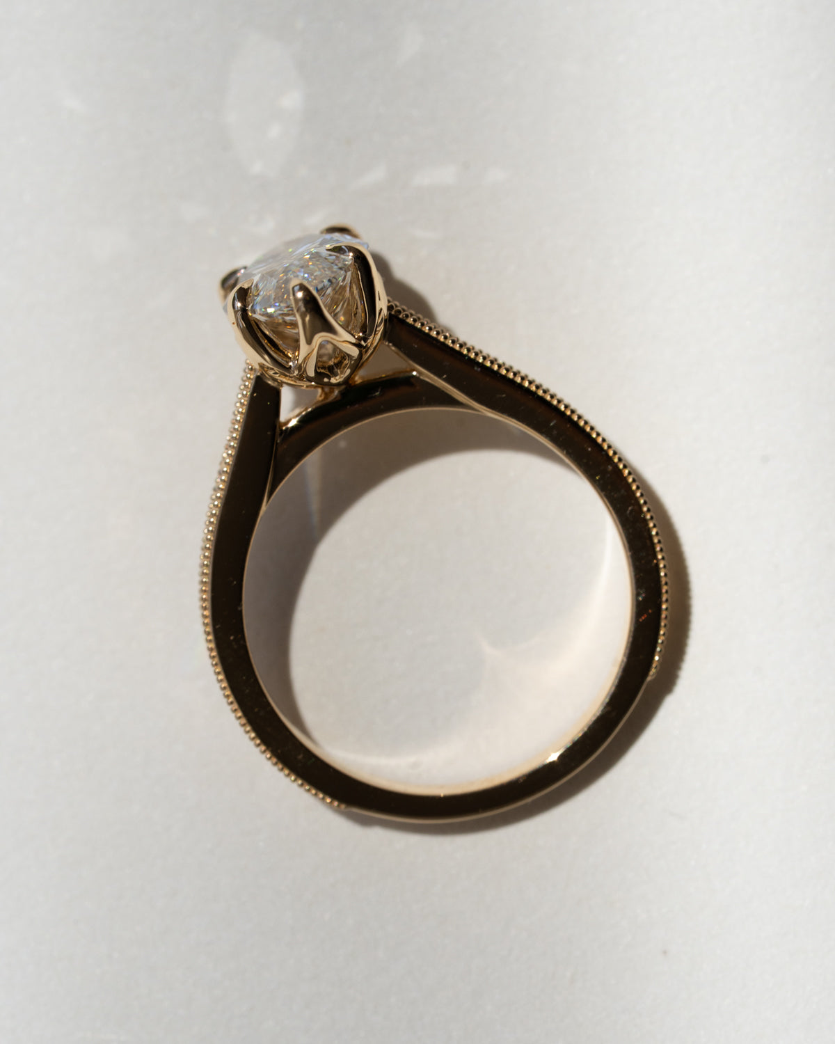 Marquise diamond with floral filigree band