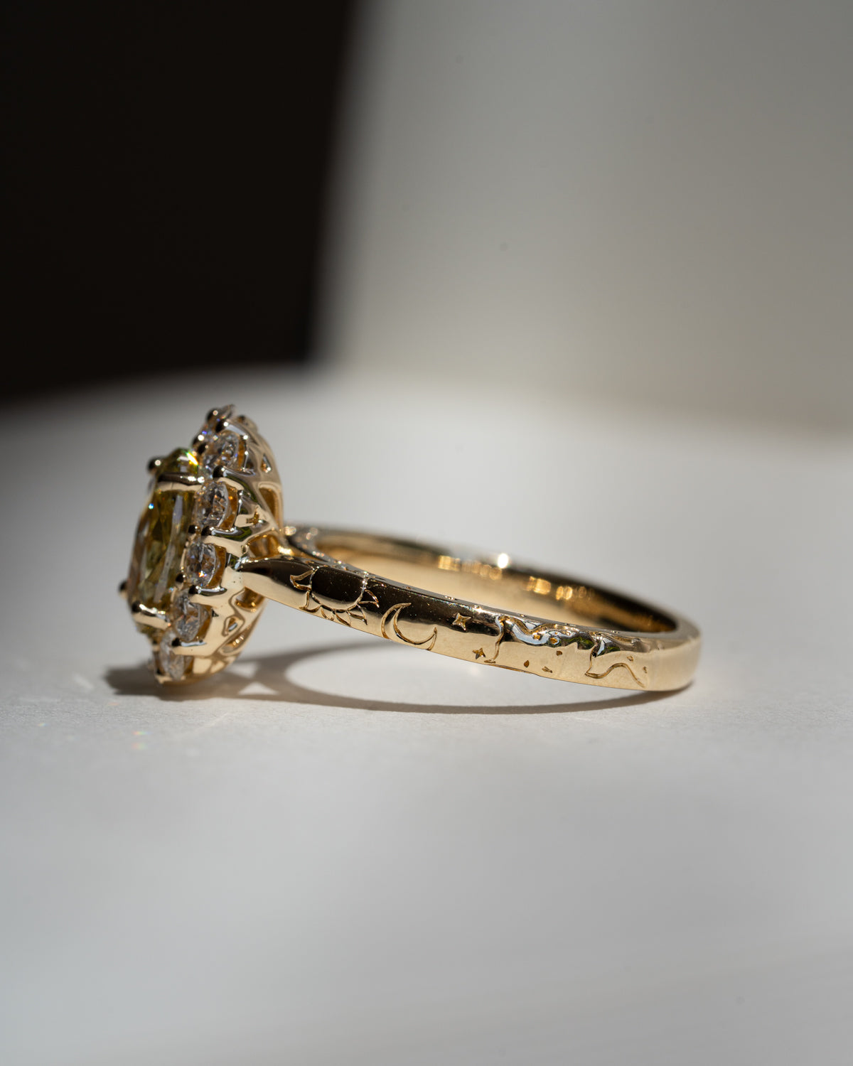 Light Yellow Oval with White Diamond Halo