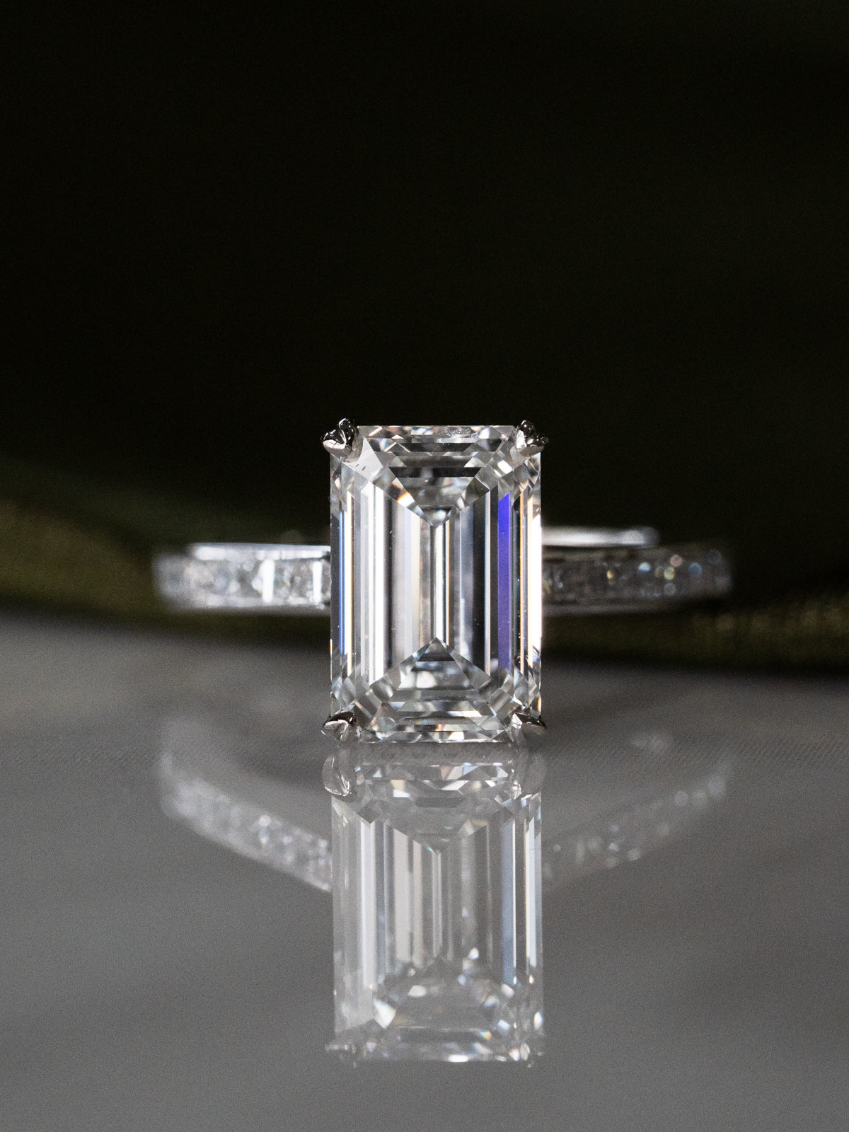 Emerald Cut Diamond with Hidden Halo and Cathedral Setting