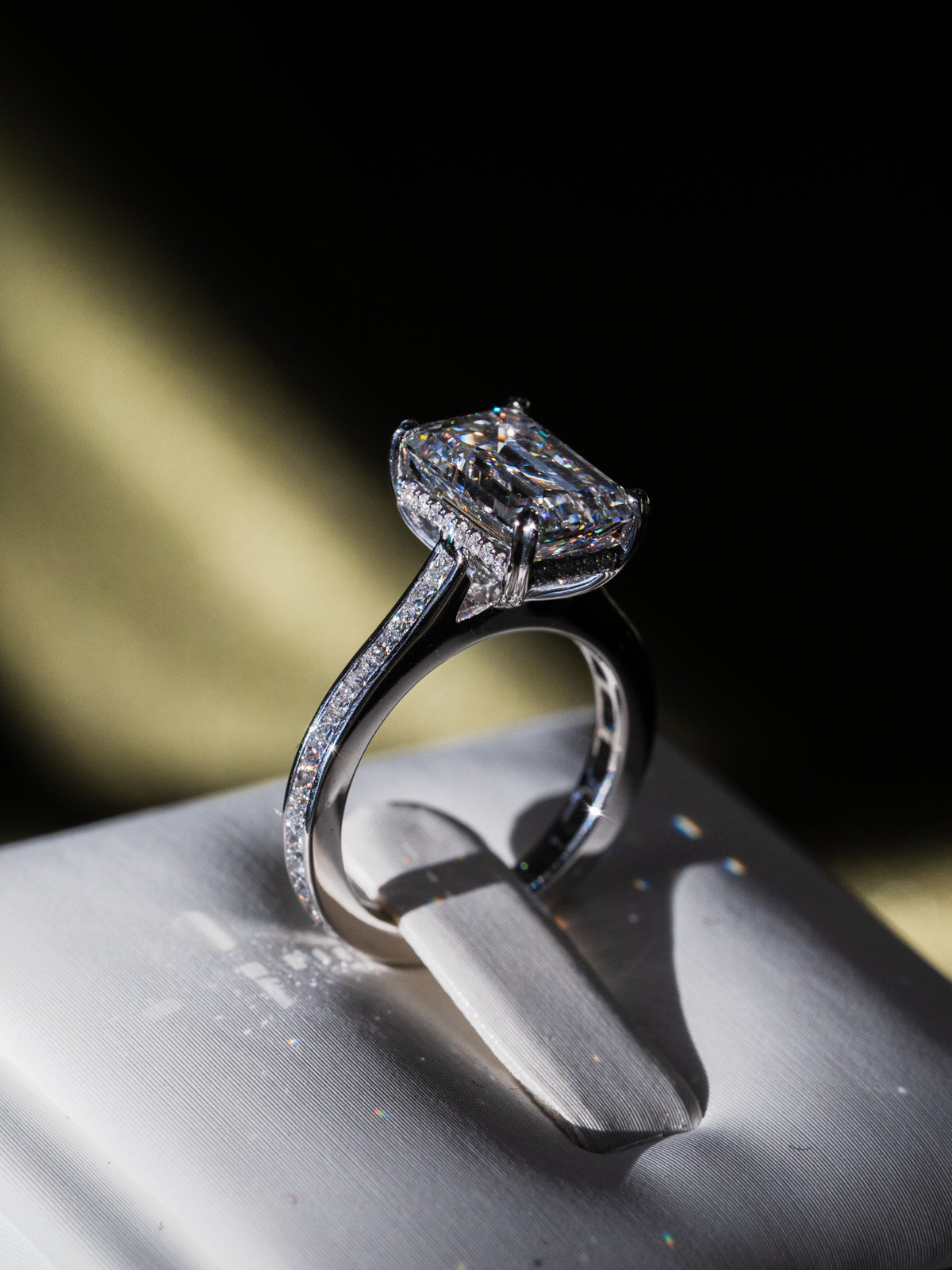 Emerald Cut Diamond with Hidden Halo and Cathedral Setting