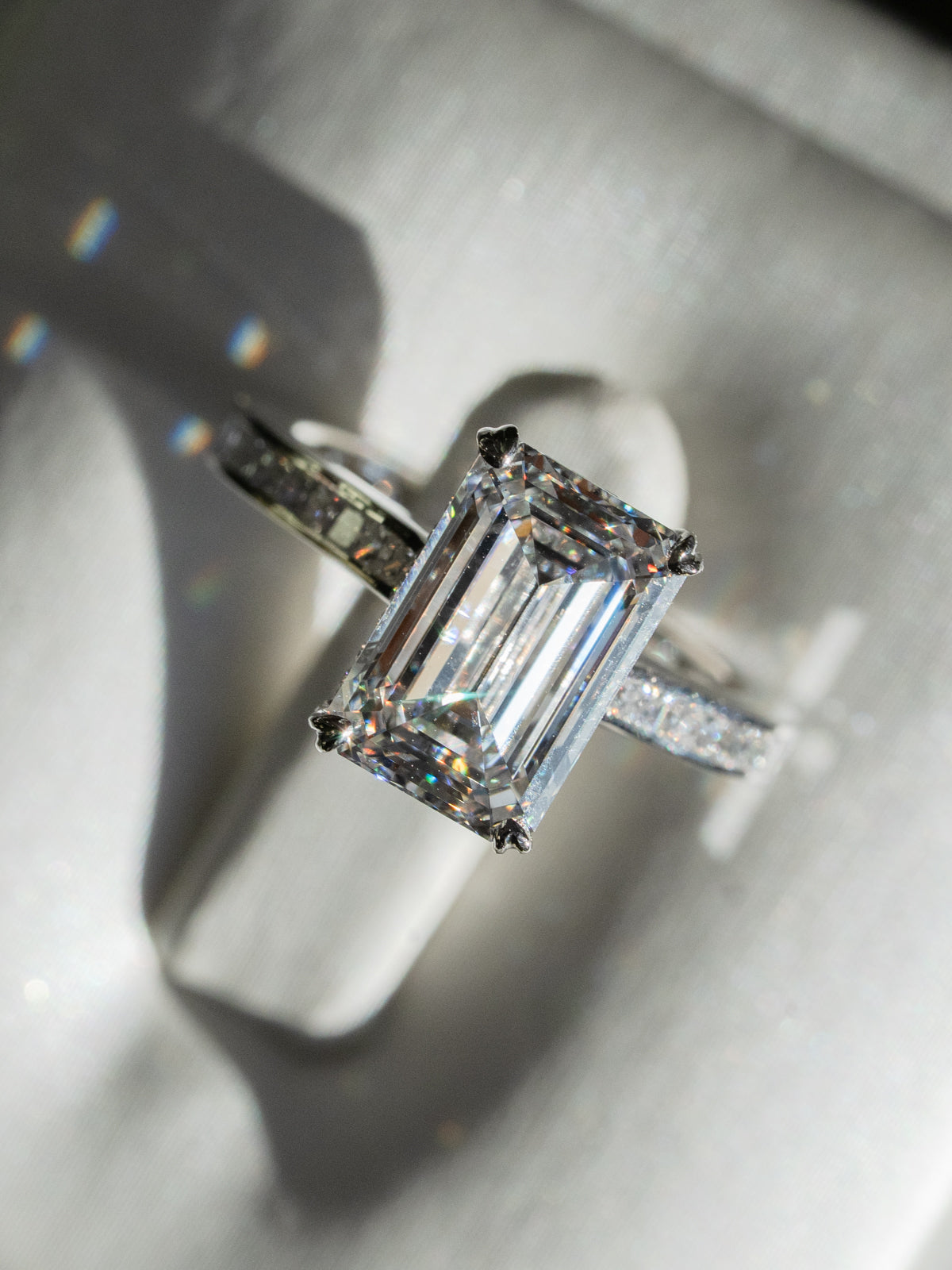 Emerald Cut Diamond with Hidden Halo and Cathedral Setting