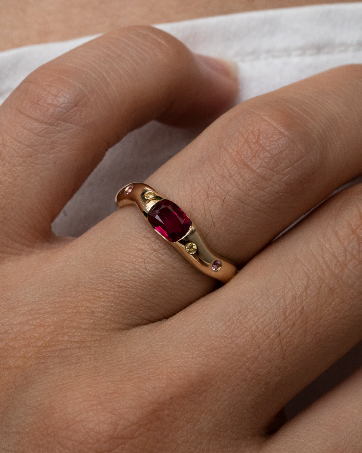 Oval Ruby with Scattered Sapphire Band