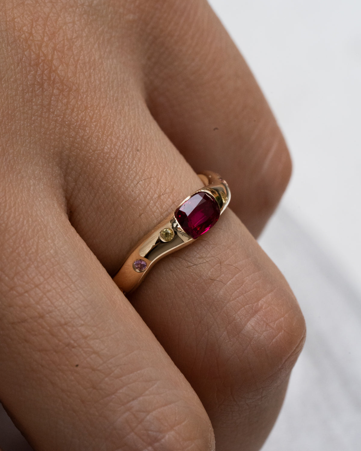 Oval Ruby with Scattered Sapphire Band