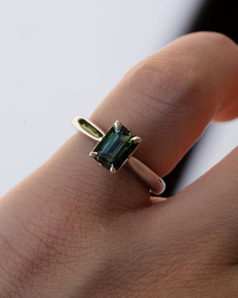Australian parti sapphire engagement ring with tulip basket setting in platinum