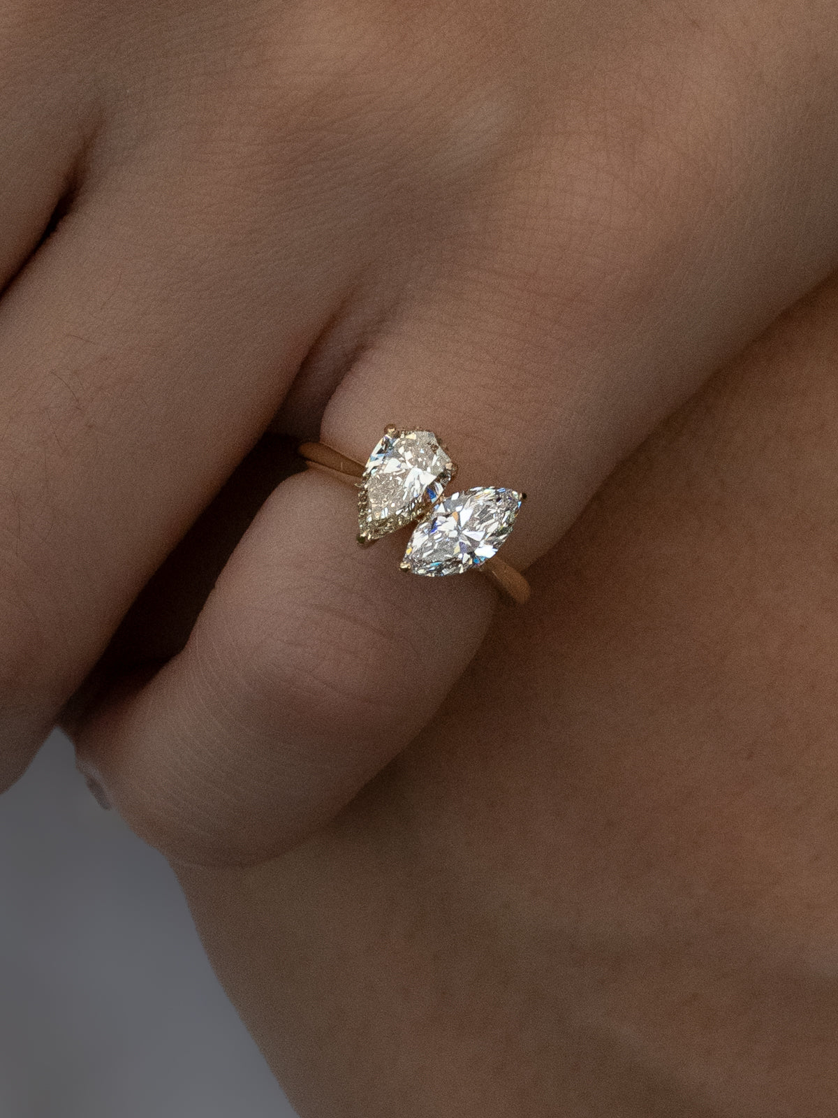 Pear and marquise toi et moi natural diamond on 18k yellow gold band