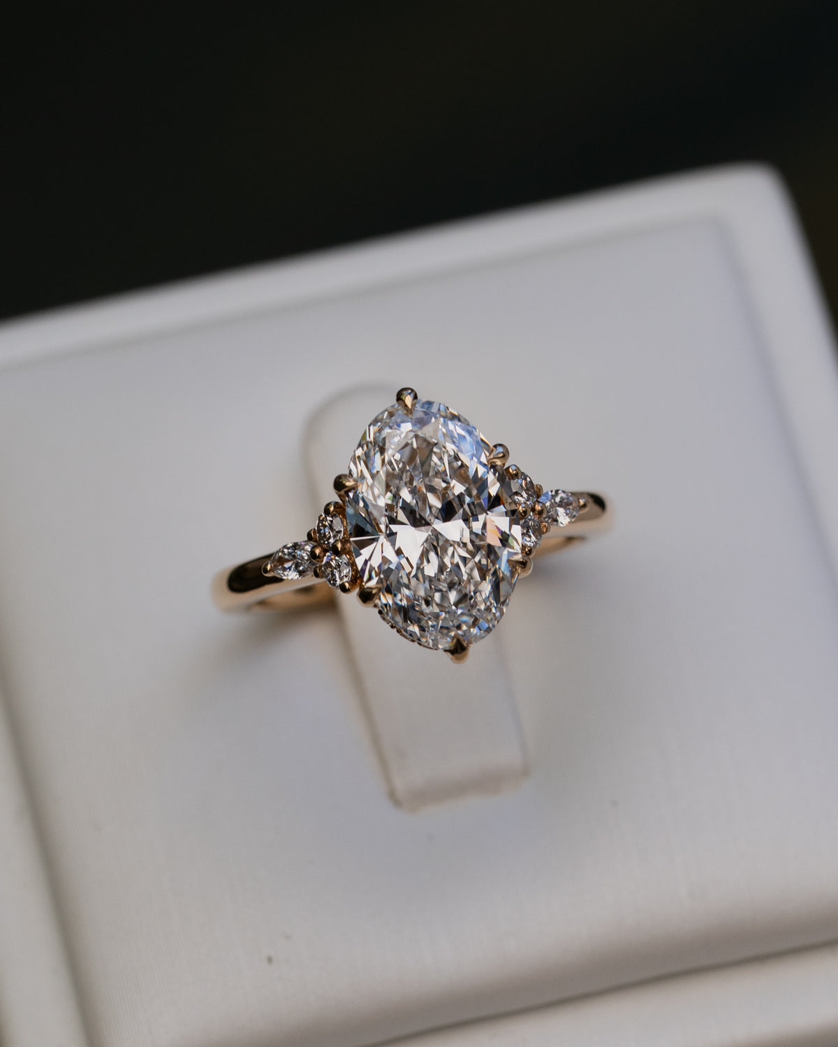 Oval Diamond with Round and Marquise Accent Stones