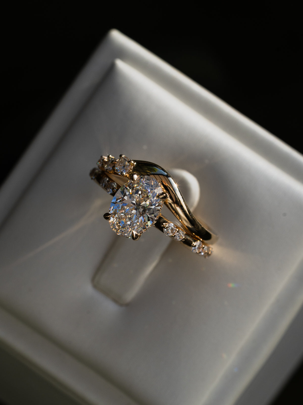 Oval Diamond Ring with Hidden Halo and Cathedral Setting